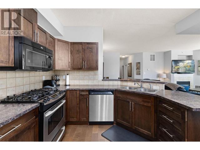 401 - 1128 Sunset Drive, Condo with 3 bedrooms, 2 bathrooms and 1 parking in Kelowna BC | Image 14