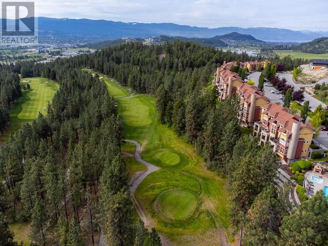 211 - 1795 Country Club Dr, House attached with 2 bedrooms, 2 bathrooms and null parking in Kelowna BC | Image 1