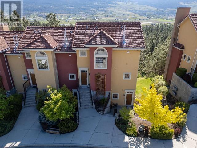 211 - 1795 Country Club Dr, House attached with 2 bedrooms, 2 bathrooms and null parking in Kelowna BC | Image 39