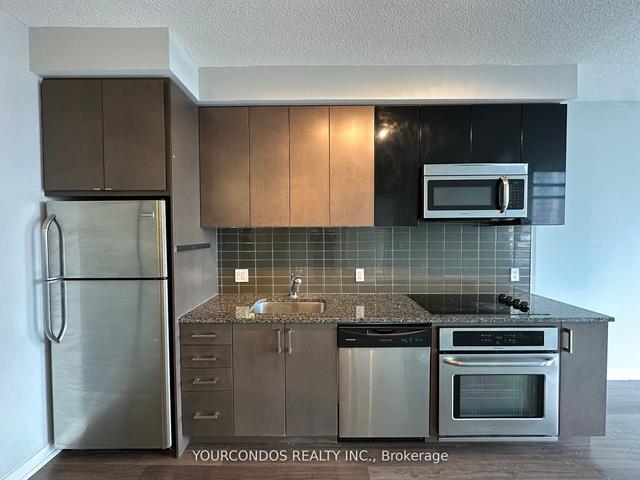 420 - 98 Lillian St, Condo with 2 bedrooms, 2 bathrooms and 1 parking in Toronto ON | Image 25