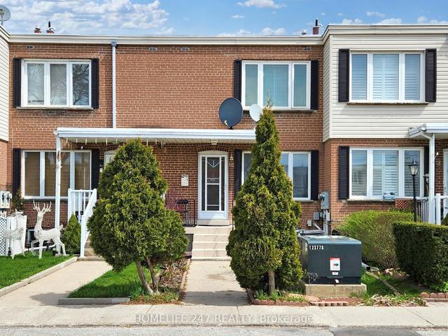 3 - 740 Kennedy Rd, House attached with 2 bedrooms, 2 bathrooms and 1 parking in Toronto ON | Image 1