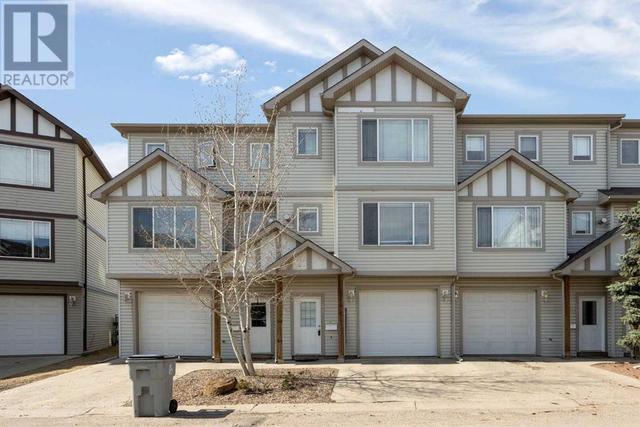 51, - 240 Laffont Way, House attached with 3 bedrooms, 2 bathrooms and 2 parking in Wood Buffalo AB | Image 1