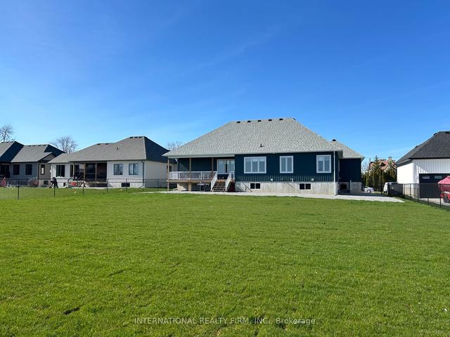 141 Lake Dr E, House detached with 4 bedrooms, 3 bathrooms and 13 parking in Georgina ON | Image 4
