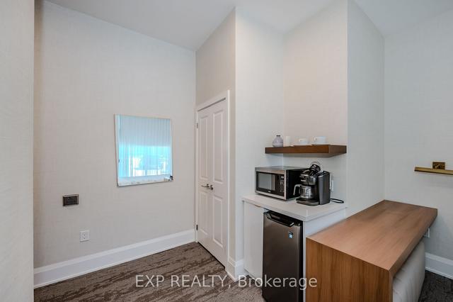 410 - 1050 Main St E, Condo with 1 bedrooms, 2 bathrooms and 1 parking in Milton ON | Image 20