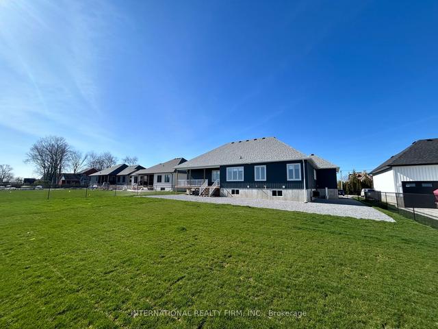 141 Lake Dr E, House detached with 4 bedrooms, 3 bathrooms and 13 parking in Georgina ON | Image 3