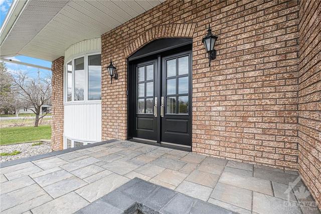 Front patio with new interlock completed 2022. | Image 4