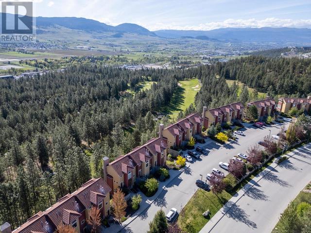 211 - 1795 Country Club Dr, House attached with 2 bedrooms, 2 bathrooms and null parking in Kelowna BC | Image 44