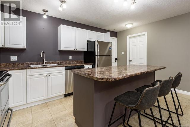 102 - 129 Back Rd, Condo with 2 bedrooms, 2 bathrooms and 1 parking in Courtenay BC | Image 7