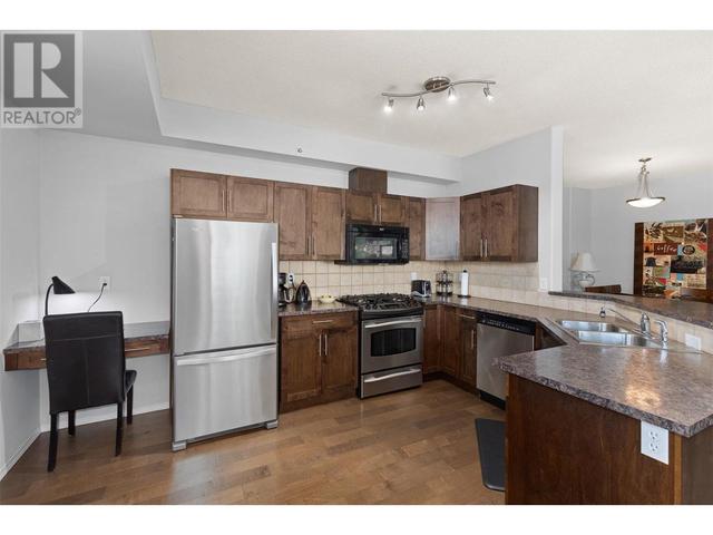 401 - 1128 Sunset Drive, Condo with 3 bedrooms, 2 bathrooms and 1 parking in Kelowna BC | Image 13