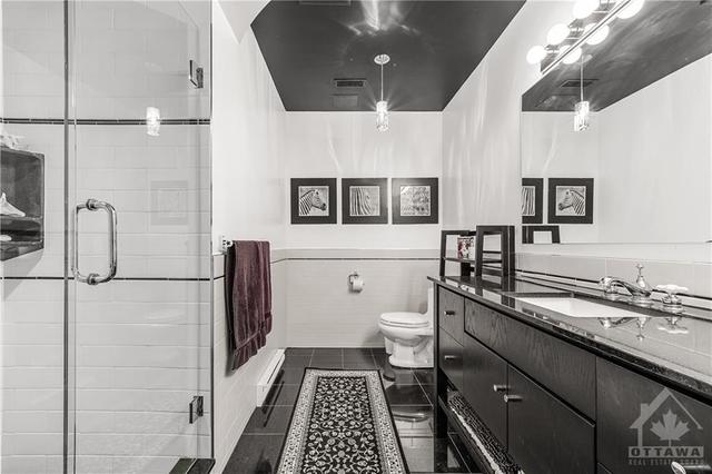 Basement - Full Bathroom with Glass Shower, Beautiful Tile, Stunning Vanity with Granite Countertops | Image 24