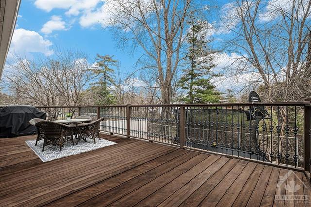 Back deck accessible directly from the Kitchen. | Image 23