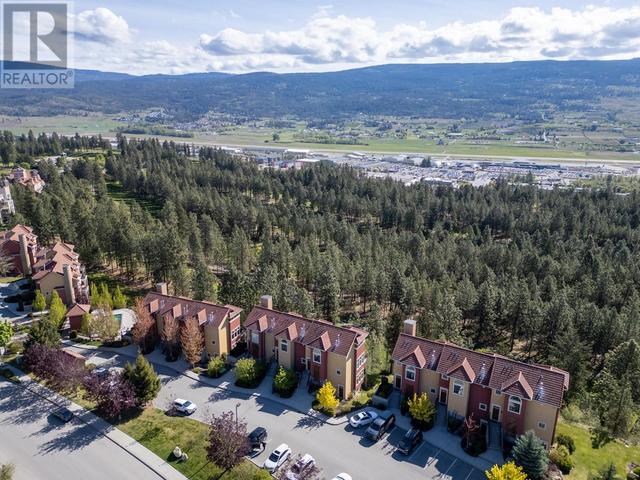 211 - 1795 Country Club Dr, House attached with 2 bedrooms, 2 bathrooms and null parking in Kelowna BC | Image 45