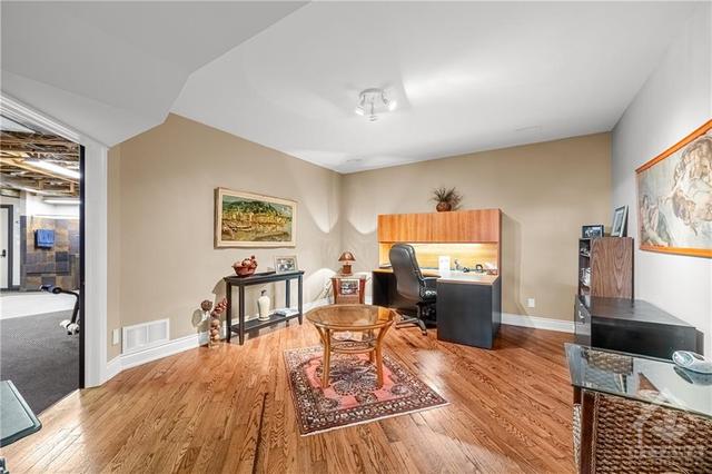 Basement - Extra space for an Office, Playroom, Games Room, etc. Through the Doors is tons of Extra Storage and a Dog Shower with entrance from Garage! (See link in Listing) | Image 21