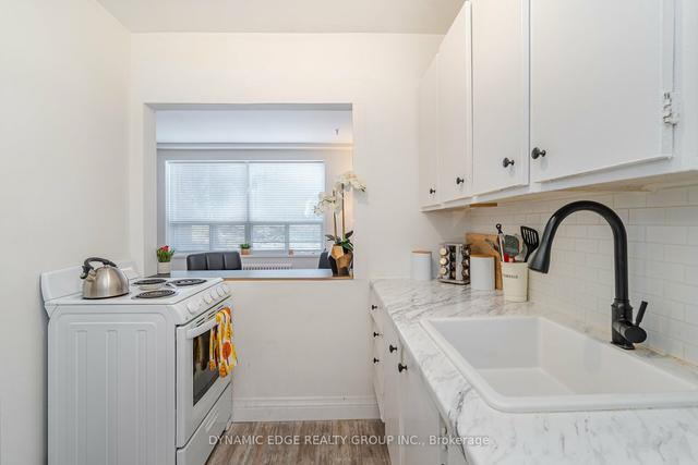103 - 57 Mericourt Rd, Condo with 2 bedrooms, 1 bathrooms and 1 parking in Hamilton ON | Image 1