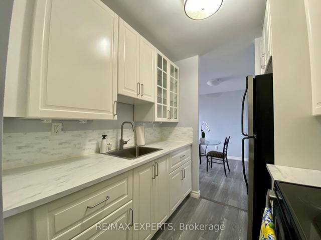 406 - 17 Eldon Hall Pl, Condo with 2 bedrooms, 1 bathrooms and 1 parking in Kingston ON | Image 9