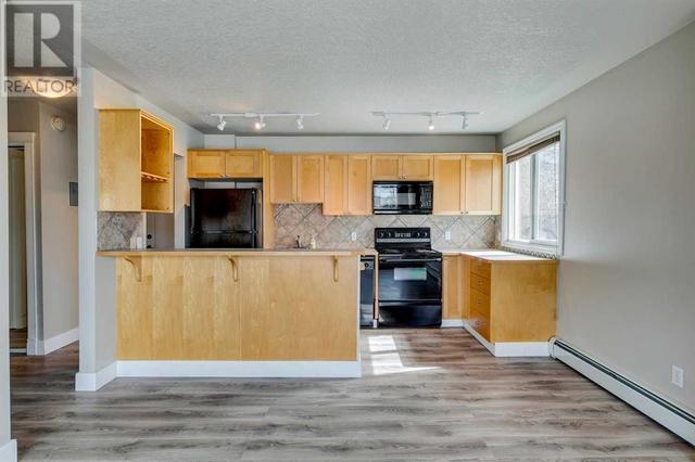 305, - 2515 14a Street Sw, Condo with 1 bedrooms, 1 bathrooms and 1 parking in Calgary AB | Image 12
