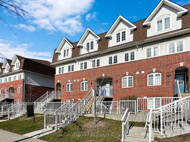 26 - 593 Kennedy Rd, Townhouse with 3 bedrooms, 2 bathrooms and 2 parking in Toronto ON | Image 1