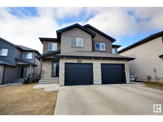 5965 167c Av Nw, House semidetached with 3 bedrooms, 2 bathrooms and null parking in Edmonton AB | Image 1