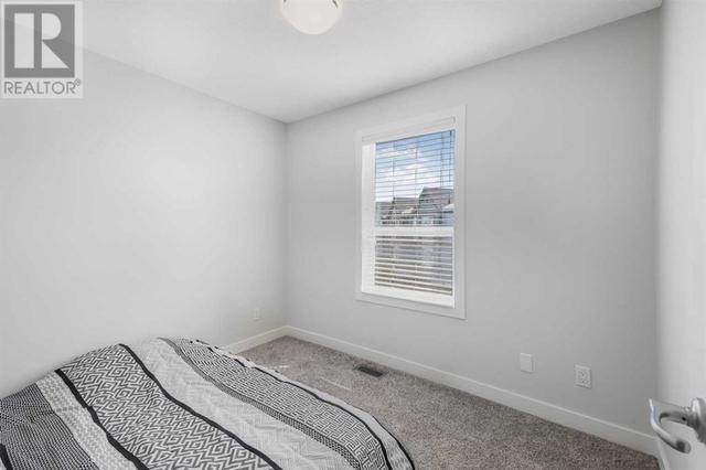 18 Evanscrest Park Nw, House attached with 3 bedrooms, 2 bathrooms and 3 parking in Calgary AB | Image 22