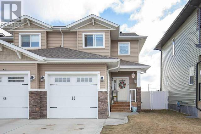 51 Iron Gate Boulevard, House semidetached with 3 bedrooms, 2 bathrooms and 2 parking in Sylvan Lake AB | Image 1