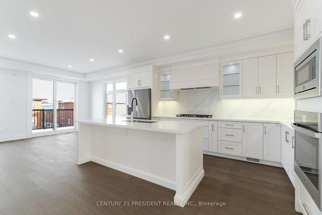 35 St Gaspar Crt, House semidetached with 3 bedrooms, 4 bathrooms and 3 parking in Toronto ON | Image 2