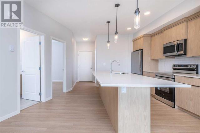 2206, - 19489 Main Street Se, Condo with 2 bedrooms, 2 bathrooms and 1 parking in Calgary AB | Image 2