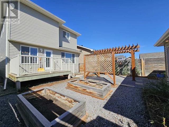 85 Mt Sundial Court W, House detached with 4 bedrooms, 3 bathrooms and 2 parking in Lethbridge AB | Image 42