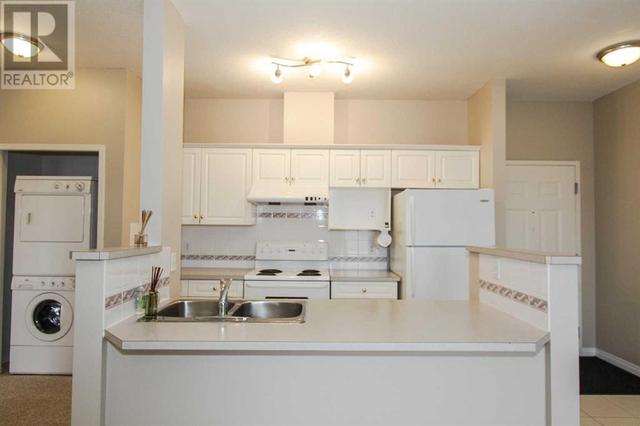 302, - 1905 Centre Street Nw, Condo with 1 bedrooms, 1 bathrooms and 1 parking in Calgary AB | Image 9