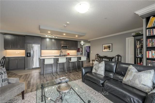 209 - 260 Villagewalk Blvd, Condo with 2 bedrooms, 2 bathrooms and 2 parking in London ON | Image 4