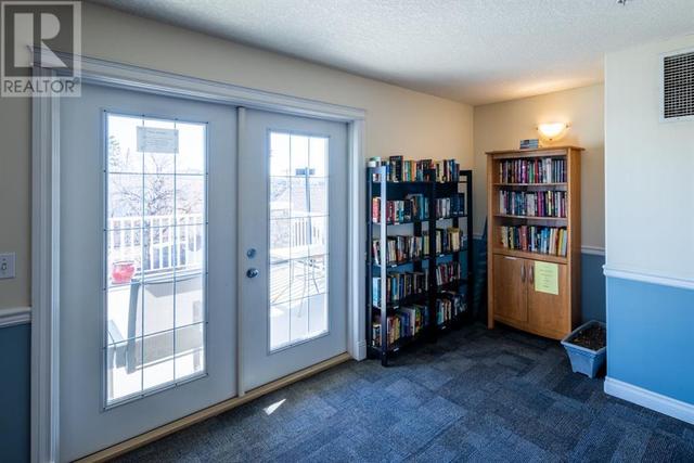 408, - 128 Centre Avenue, Condo with 2 bedrooms, 2 bathrooms and 1 parking in Cochrane AB | Image 38