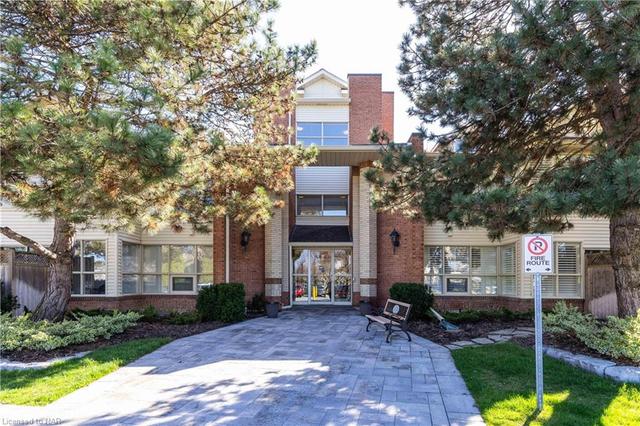 103 - 244 Lakeshore Road, House attached with 2 bedrooms, 2 bathrooms and 2 parking in St. Catharines ON | Image 1