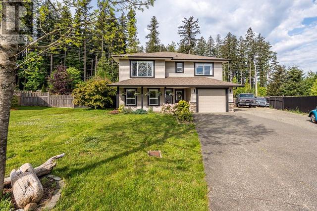 2581 Carstairs Dr, House detached with 5 bedrooms, 3 bathrooms and 1 parking in Courtenay BC | Image 2