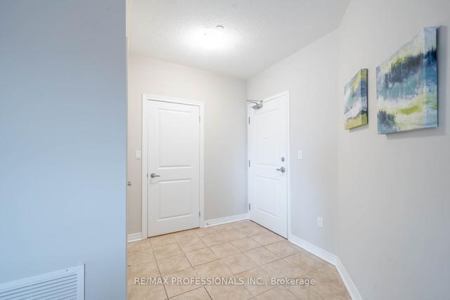 209 - 33 Whitmer St, Condo with 2 bedrooms, 2 bathrooms and 1 parking in Milton ON | Image 25