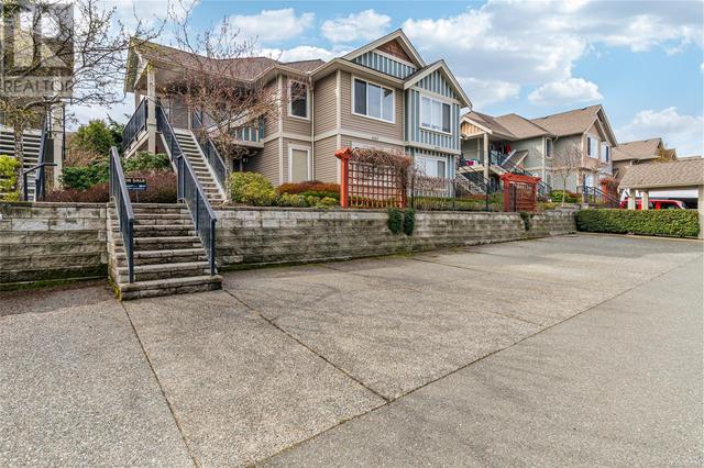 101 - 6157 Washington Way, House attached with 2 bedrooms, 2 bathrooms and 2 parking in Nanaimo BC | Image 41