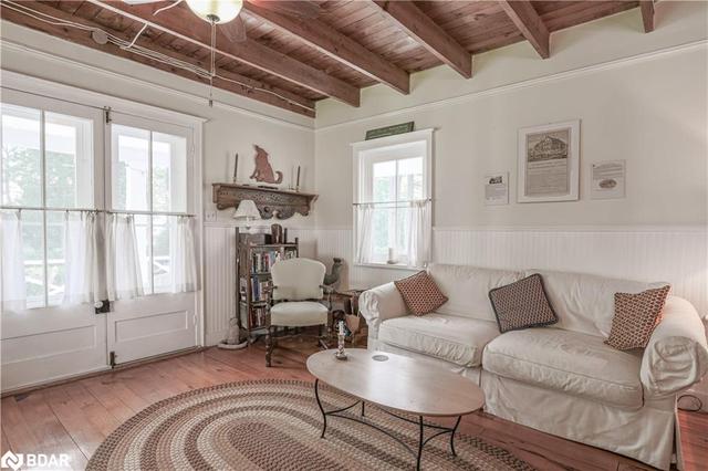 Living Room with Antique French Doors to Porch | Image 18