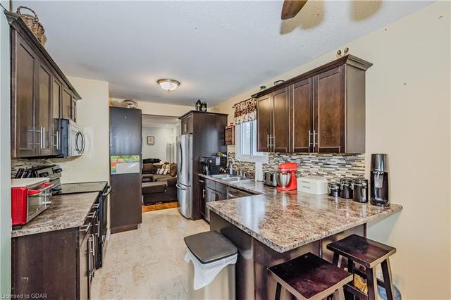 38 - 80 Ferman Dr, House attached with 3 bedrooms, 1 bathrooms and 1 parking in Guelph ON | Image 2