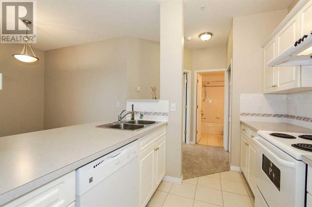 302, - 1905 Centre Street Nw, Condo with 1 bedrooms, 1 bathrooms and 1 parking in Calgary AB | Image 20