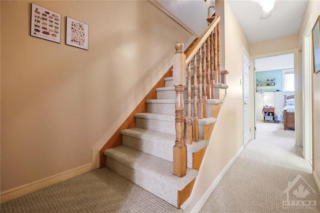Staircase to lower level. | Image 11