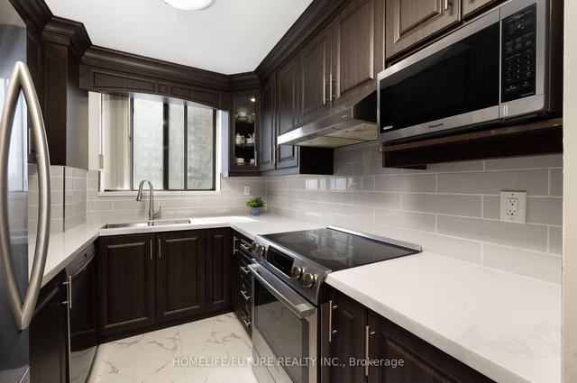 411 - 10 Tapscott Rd, Condo with 2 bedrooms, 2 bathrooms and 1 parking in Toronto ON | Image 8
