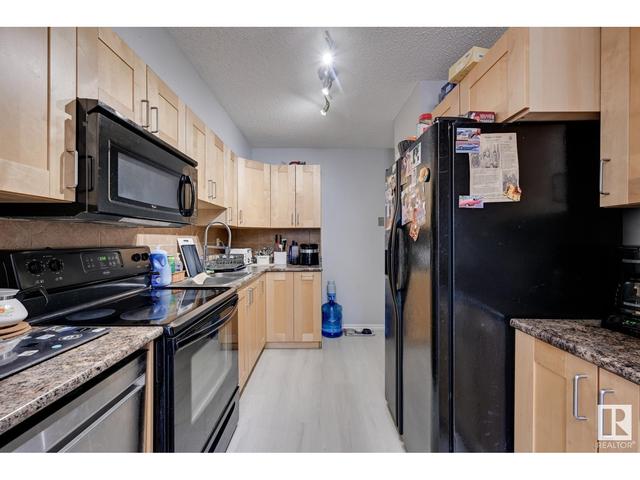 2326 139 Av Nw, House attached with 3 bedrooms, 1 bathrooms and null parking in Edmonton AB | Image 2