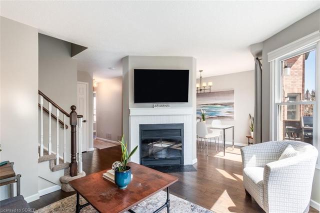 Living room showing fireplace | Image 8