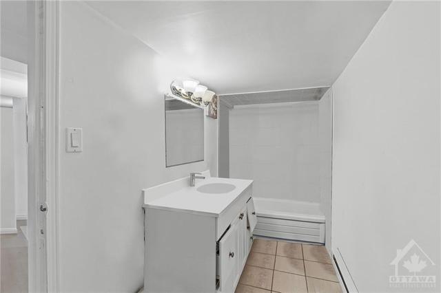 (Virtually Altered) Lower Level 1 Bedroom Apt- 4 Piece bathroom. | Image 22
