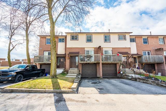 103 - 1115 Paramount Dr, Townhouse with 3 bedrooms, 2 bathrooms and 2 parking in Hamilton ON | Image 1