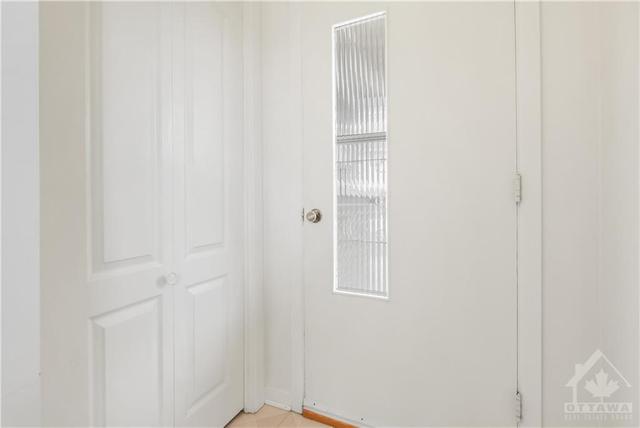 Front entrance with storage closet | Image 3