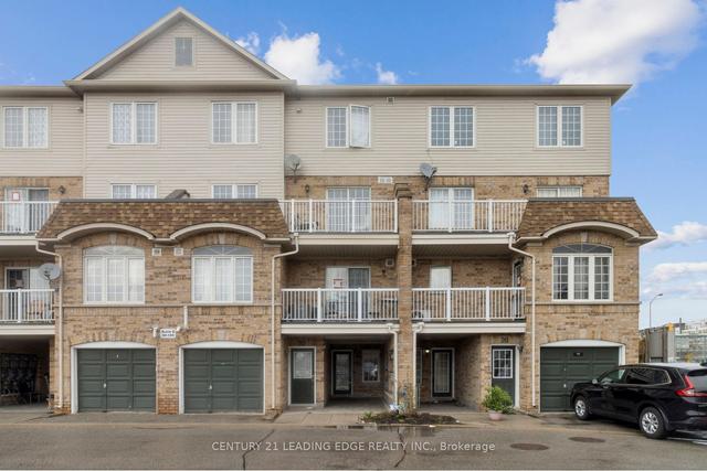96 - 200 Mclevin Ave, Townhouse with 2 bedrooms, 1 bathrooms and 1 parking in Toronto ON | Image 1