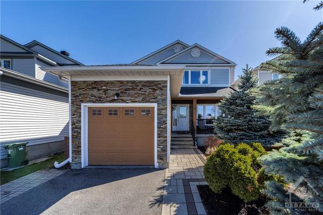 77 Merner Avenue, House detached with 3 bedrooms, 3 bathrooms and 3 parking in Ottawa ON | Image 1
