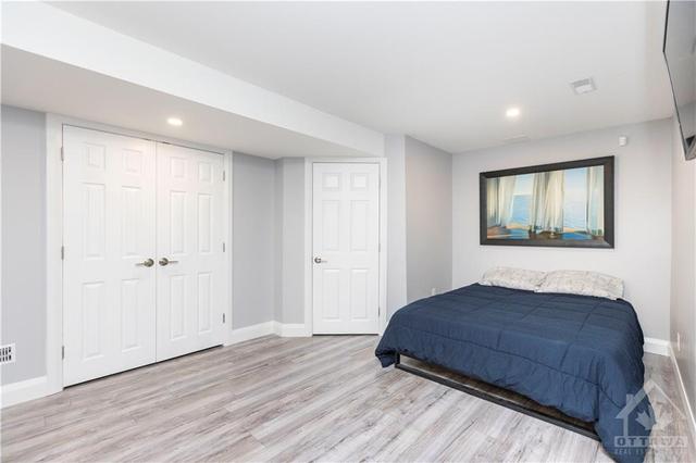 Lower level bedroom offers the ideal teen retreat | Image 19