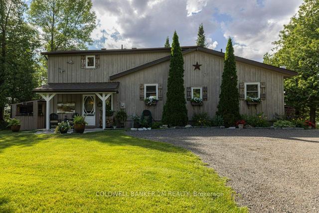 1004 Rocky Shore Lane, House detached with 3 bedrooms, 2 bathrooms and 9 parking in South Frontenac ON | Image 1
