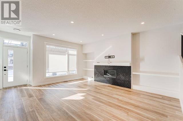 1, - 630 56 Ave Sw Avenue Sw, House attached with 3 bedrooms, 3 bathrooms and 1 parking in Calgary AB | Image 4