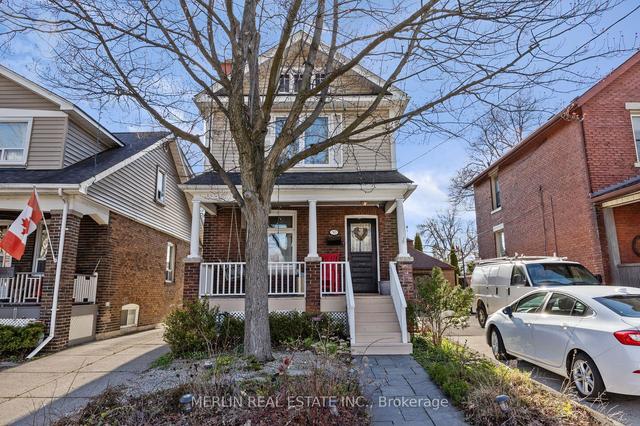 50 Twenty Second St, House detached with 3 bedrooms, 2 bathrooms and 2 parking in Toronto ON | Image 1